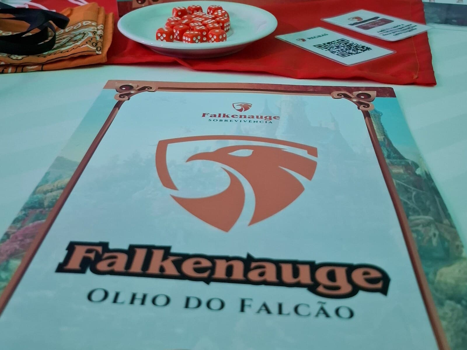 A Falcon Eye board printed and finished under a licensee's own brand, the duel dice in a dish beside it on the table.
